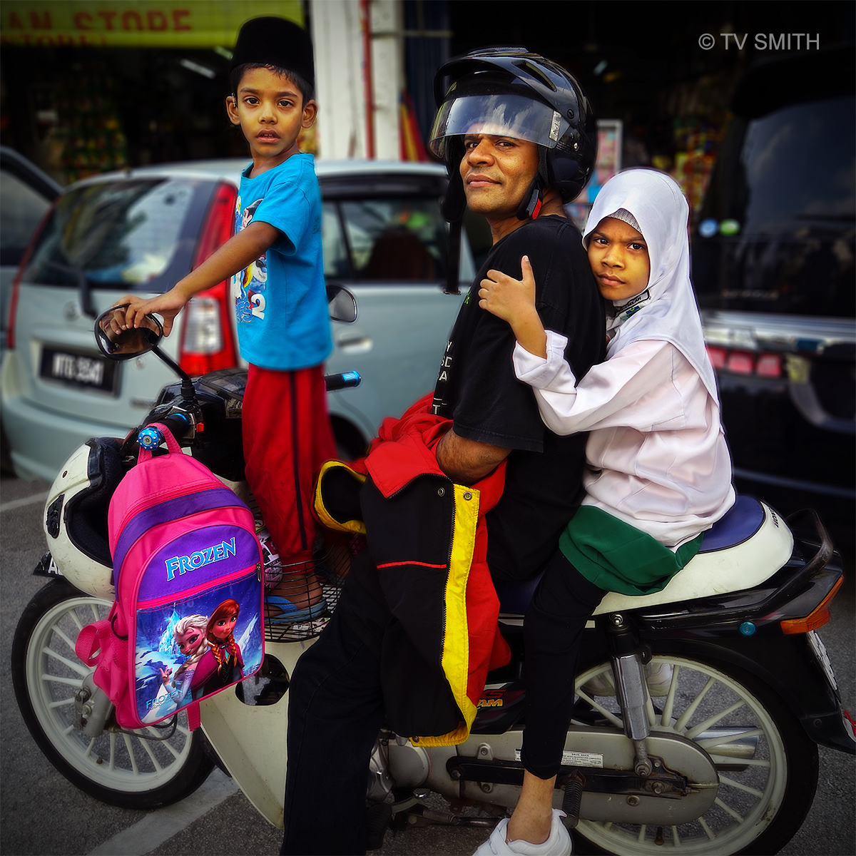 A family on a motorcycle